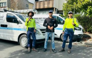 Metro Water Blasting house washing crew preparing to clean a residential property in Auckland.