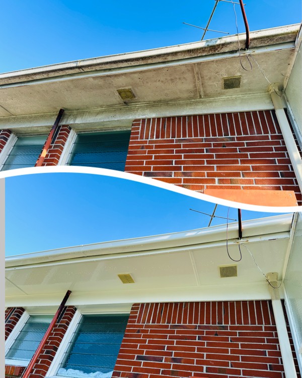 Clean house soffits and spouting after professional washing, free from dirt, mold, and grime buildup.